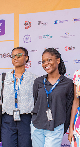 Two FutureHER attendees smiling together