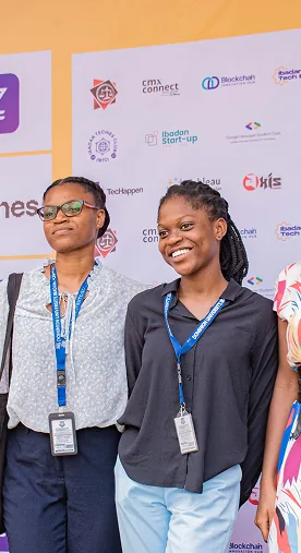 Two FutureHER attendees smiling together